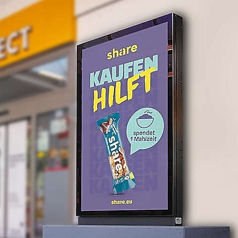 Werbung für share auf Screen an Shell Station